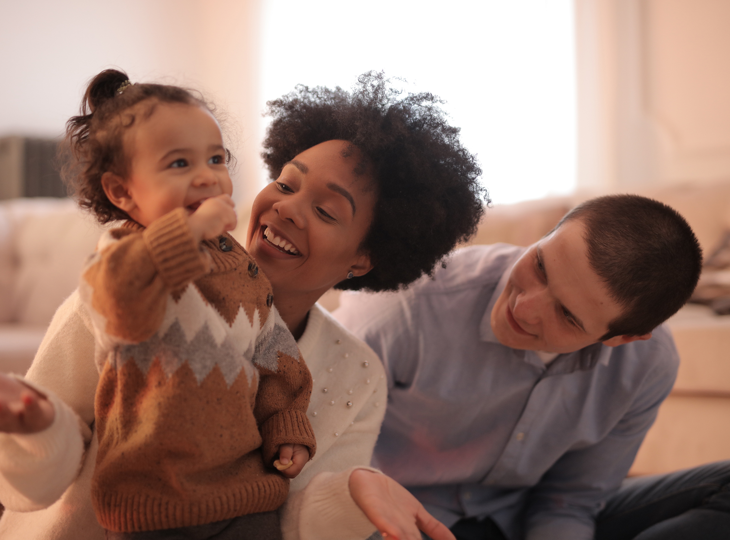 photo-of-man-and-woman-having-fun-with-their-child-3820065